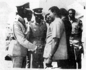 NIGERIA'S GENERAL YAKUBU GOWON (VICTOR) SHAKES HANDS WITH GENERAL PHILIP EFFIONG (VANQUISHED), AFTER THE FORMALITIES FOR THE SURRENDER OF BIAFRA WAS COMPLETED.